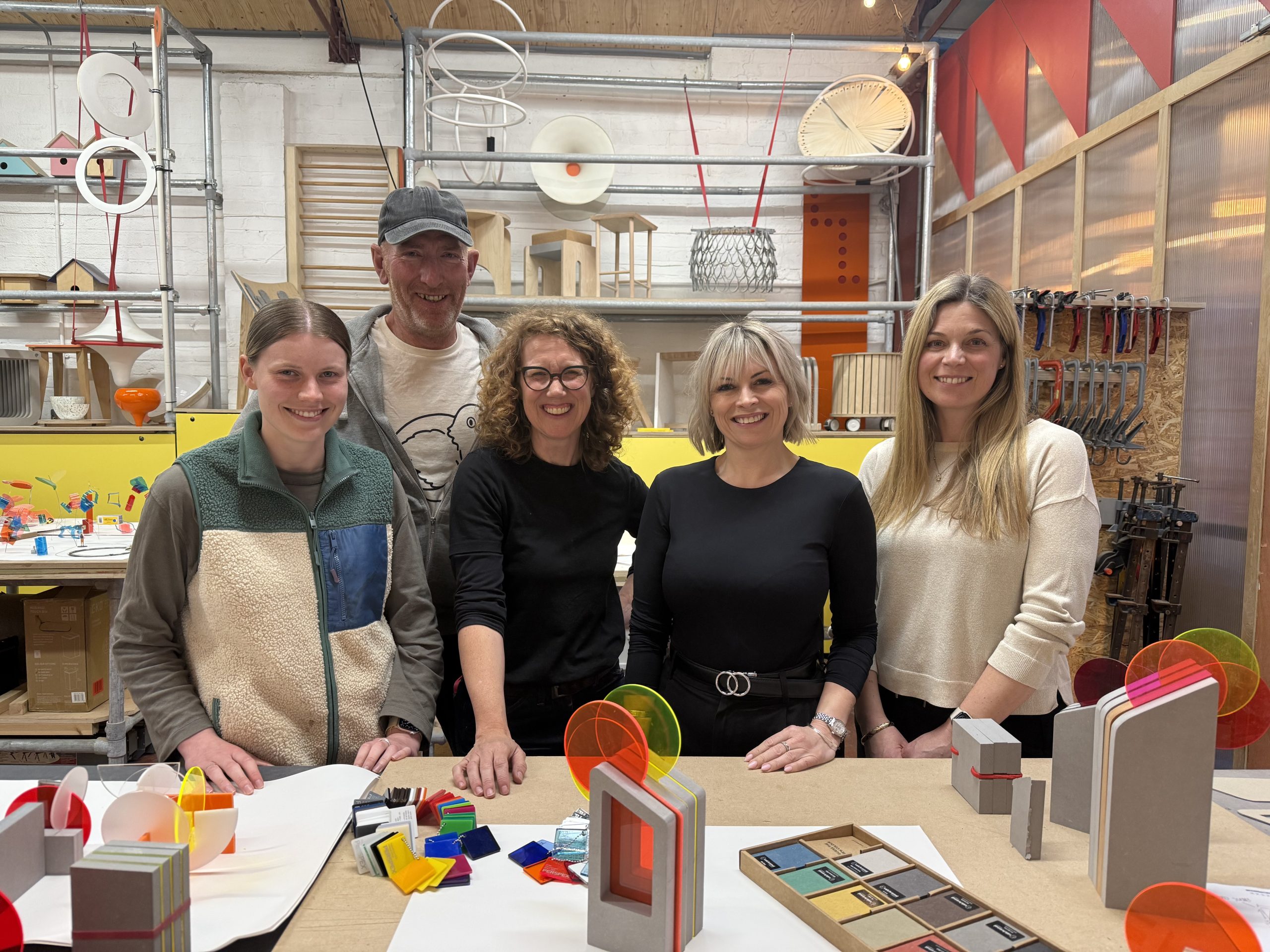 FleetMilne Managing Director - Nicola Fleet-Milne - and Kelly Hastlehurst with the Dual Works team, creating the Birmingham Best Places to Work Awards 2026 trohpies.