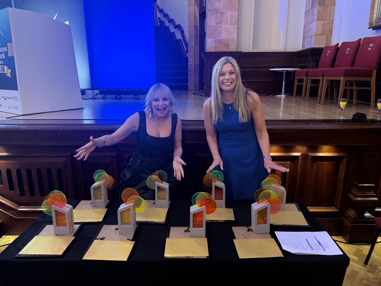 FleetMilne MD - Nicola Fleet-Milne - and FleetMilne Head of Marketing - Kelly Hastlehurst - with the Birmingham Best Places to Work Awards 2026 trophies.